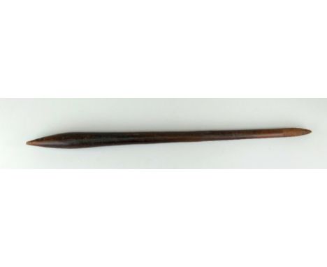 SOUTH-SEAS HARDWOOD FIGHTING STICK OR THROWING CLUB of slender elongated tapering form, both ends terminating with rounded po