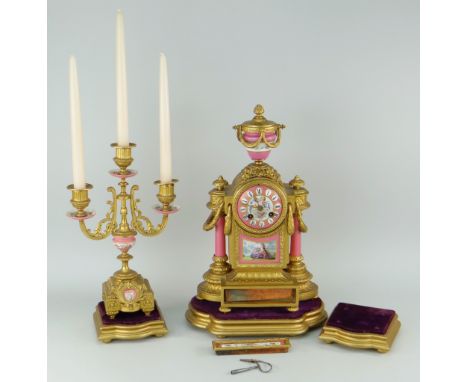 FRENCH PINK PORCELAIN &amp; GILT METAL MANTEL CLOCK late nineteenth century of typical rococo form with pillars, urn-finial, 