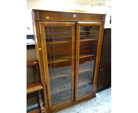 VINTAGE MAHOGANY TWO DOOR GLAZED BOOKCASE WITH LEADED DECORATION