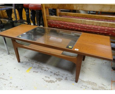 MID-CENTURY G-PLAN TEAK LONG-JOHN COFFEE TABLE with centre glass revealing to a lower shelf