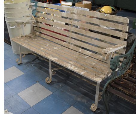 A Wooden Slatted and Cast Iron Framed Garden Bench, 151cms Wide 