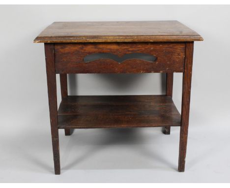 An Edwardian Oak Rectangular Topped Occasional Table with Stretcher Shelf, 60cms Wide and 58cms High 