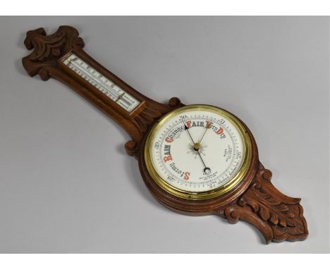 An Edwardian Oak Framed Aneroid Wheel Barometer 