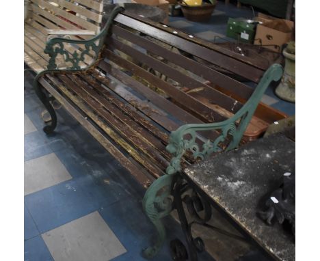 A Cast Iron and Wooden Slatted Garden Bench, Sides with Pierced Design and Lion Mask Arm Rests, 126cms Wide 