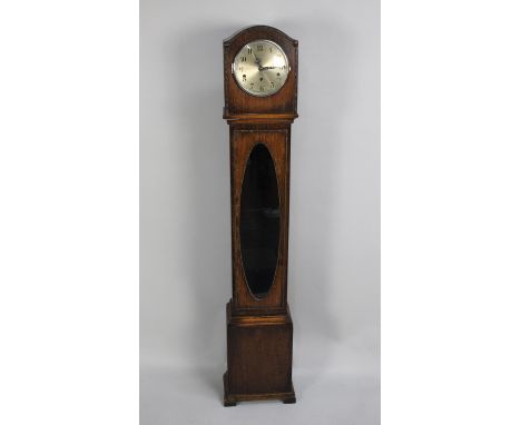 A Mid 20th Century Oak Grandmother Clock with Westminster Chime Movement, Together with a Purpose Built Plinth Stand 