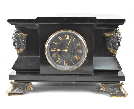 A Very Heavy French Black Slate Ormolu Mounted Mantel Clock with Ogee Bracket Feet, 41cms Wide 