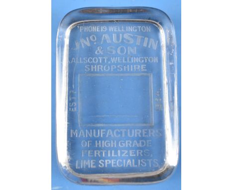 A Vintage Desk top Glass Advertising paperweight for Austin and Son, Allscott, Wellington, Manufacturers of Fertilisers,10.5x