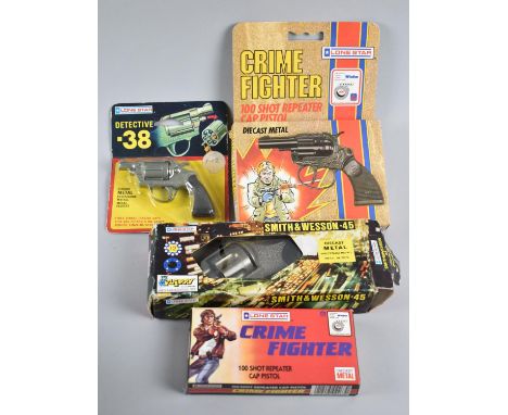 A Collection of Four Various Vintage Toy Cap Guns 