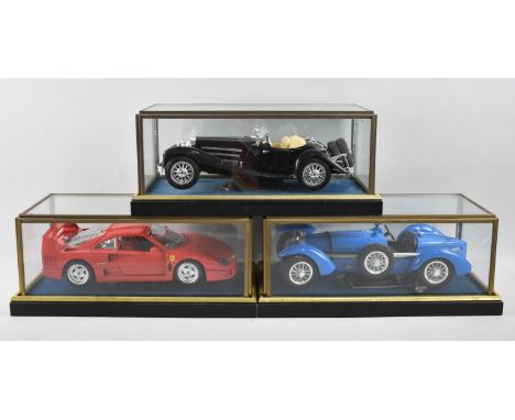 Three Cased Diecast Models, Ferrari, Vintage Sports Car and Racing Car, Each case 29cms Wide 