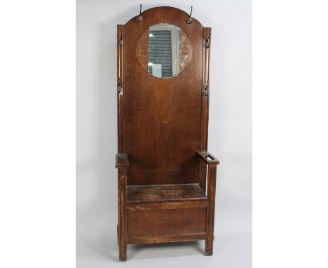 An Edwardian Oak Hall Stand with Hinged Box Seat, Mirrored Back and Six Coat Hooks, 71cms Wide 