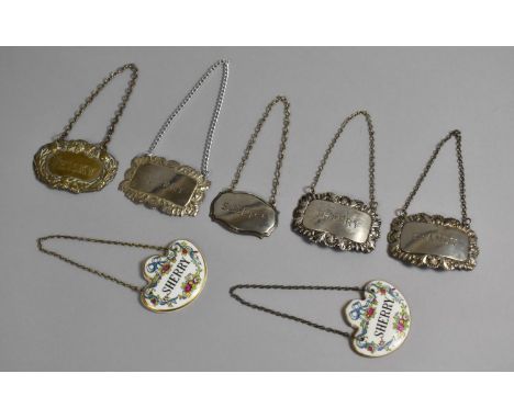 A Collection of Various Silver Plated and Ceramic Decanter Labels 