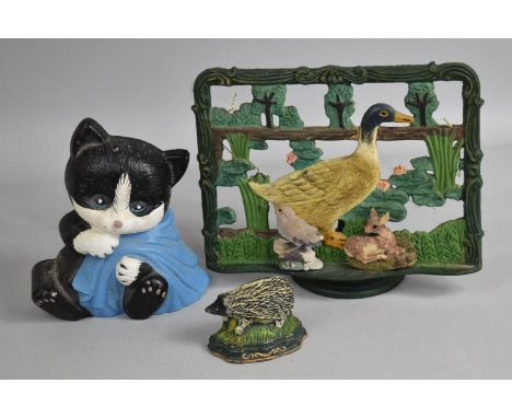 A Modern Painted Cast Metal recipe Book Stand, Two Doorstops and Mouse and Chick Fridge Magnets 