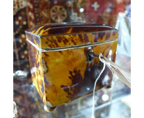 A fine quality regency period tortoiseshell tea caddy 
