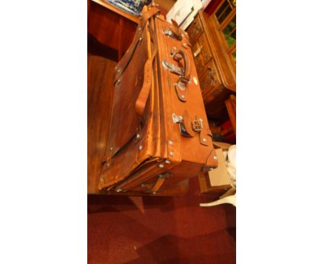 A vintage dark brown alligator skin suitcase lined with green silk 51 x 37 x 19cm 