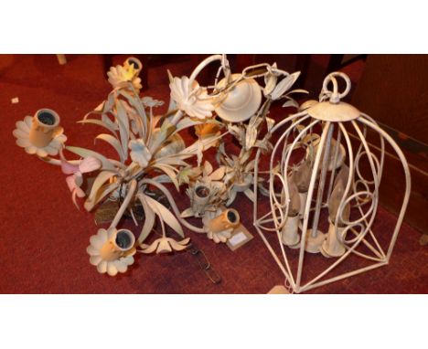 A floral decorated hanging chandelier and two others 