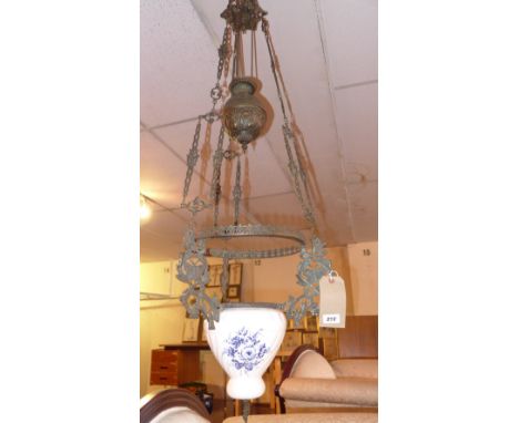 An early 20th century brass porcelain hanging light 