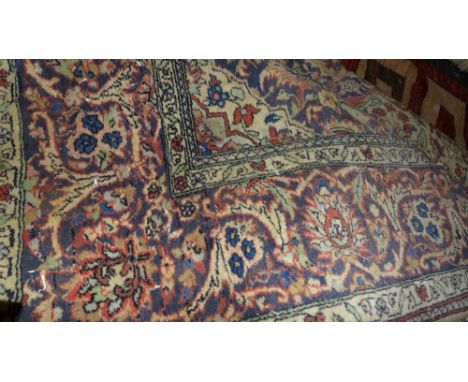 An extremely fine central Persian Nain carpet 345 x 250cm central double pendent medallion with repeating spandrels on a roug