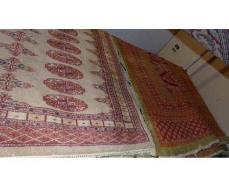 A very large contemporary carpet decorated with polychrome tiles on a red field 