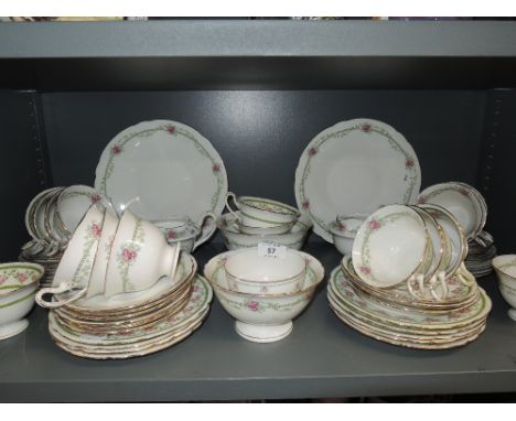 A large part tea service by Wileman / Shelley with transfer print design