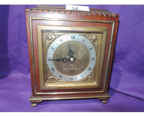 A mantle clock retailed by Parkhouse &amp; Wyatt Southampton an Elliott clock