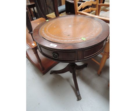 A reproduction drum style occasional table