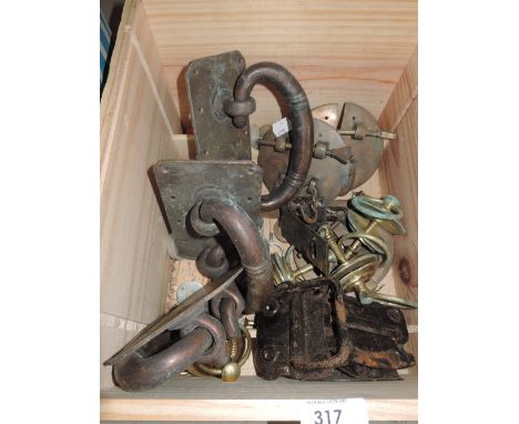 A selection of heavy cast hardware and door handle