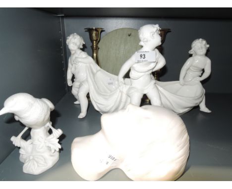 A selection of ceramics including plaster cast mask and bisque bird figure