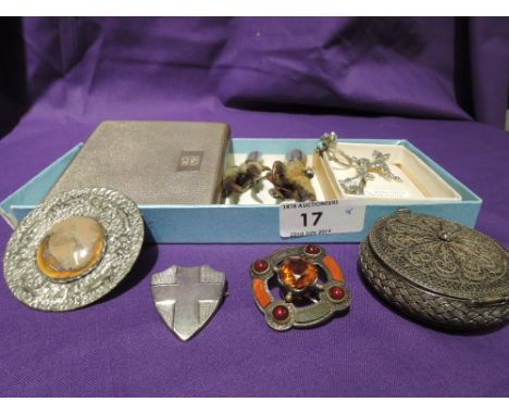 A small selection of vintage white metal costume jewellery including shield brooch, claw brooches, filligree trinket box, mar