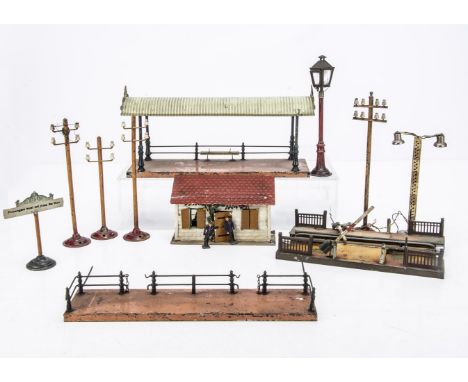 An Assortment of Gauge 1 Lineside Accessories by German makers, mostly Märklin or Bing, including a canopied station platform