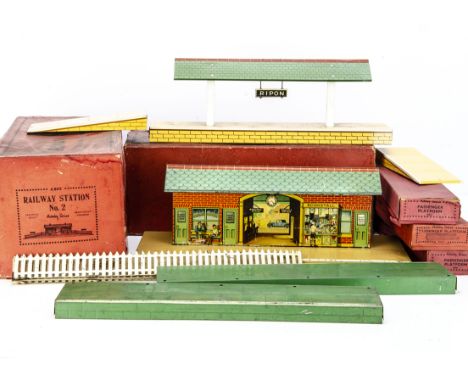 Boxed Hornby 0 Gauge Stations and Platform Extensions, a No 1 Wayside Station on buff base, without chimneys or ramps, No 2 S