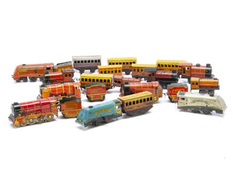 Collection of unboxed 0 Gauge Clockwork Wells-Brimtoy 0-4-0 Locomotives Tenders and Coaches, including Streamline 0-4-0 King 