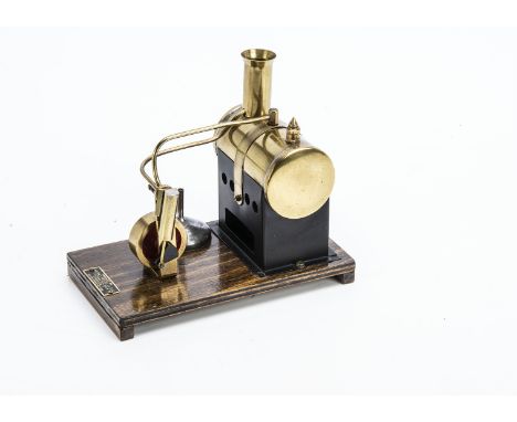 A restored Stationary Steam Engine by Mersey Model Co,  with single oscillating cylinder mounted vertically , approx 1½" diam