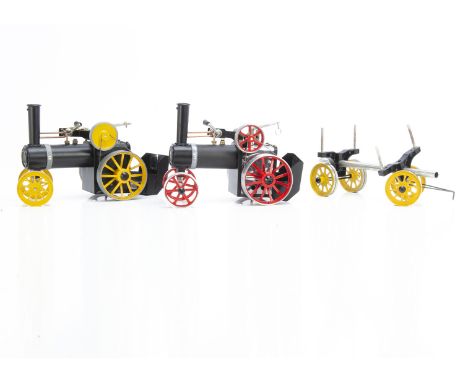 Two kit-built Mamod Traction Engines and Lumber Trailer, the older engine in black and yellow, with solid flywheel and 'artil