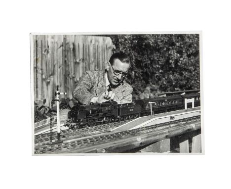 A snapshot silver print accumulation of images of model and toy steam rail and road locomotives,  taken by visiting enthusia