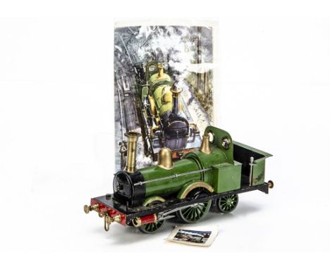 A scratchbuilt 0 Gauge 3-rail 2-2-2 Tank Locomotive, a slightly-over-scale freelance model finished in green with brass and g