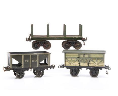 Three Bing Gauge 1 Goods Wagons, a bogie trestle wagon in green with yellow lining, G, some period lettering hand-applied 'La