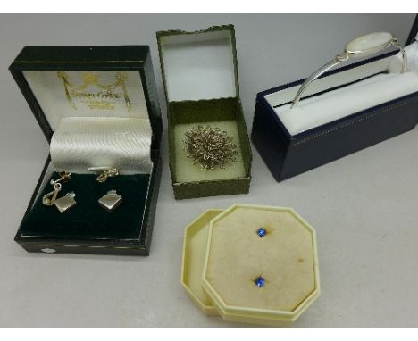 Silver jewellery including earrings, a brooch and a silver bangle