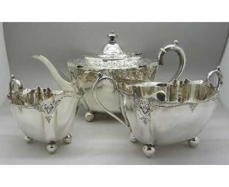 An early 20th Century three piece plated tea service, marked L & Co., 2831