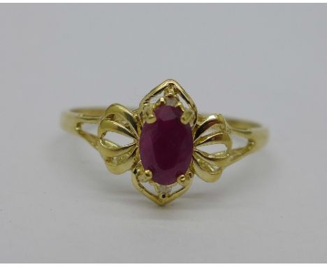 A 9ct gold, diamond and ruby ring, weight 1g, size O