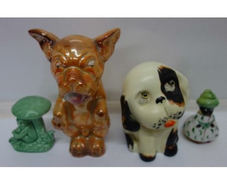 A Crown Devon dog, a lustre dog, a/f, a Sylvac pixie and a novelty cruet, a/f