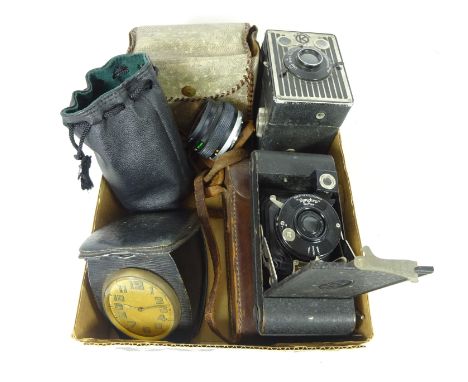 Ensign camera, box brownie camera, Olympus 135mm lens, Olympus 50mm lens and a early 20th Century Vintage travel clock   Cond