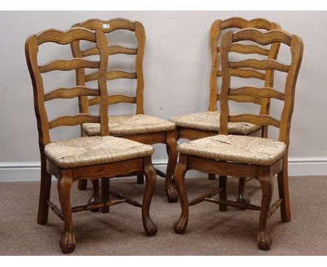 Set of four oak French country house style ladder back dining chairs, drop in rush seats   Condition Report   Click here for 