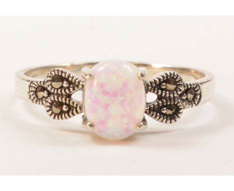 Opal and marcasite ring stamped 925   Condition Report   Click here for further images, condition, auction times & delivery c