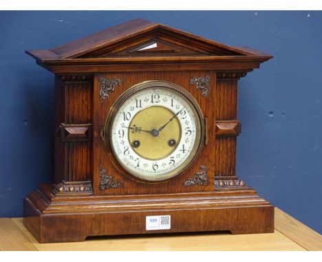 Edwardian architectural oak cased mantle clock, circular dial, fluted columns on stepped base, twin train Junghans movement s