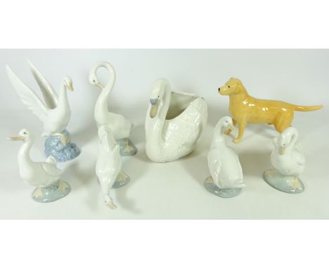 Nao swan planter, two other swans, four ducks and a Beswick Labrador (8)   Condition Report   Click here for further images, 