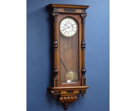 Vienna walnut wall clock, dial painted Fattorini & Sons Bradford, twin weight movement striking the half hours on a coil, H11