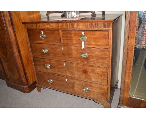 A 19th Century inlaid mahogany chest of drawers with decorative inlay to the frieze, above two short and three long graduatin