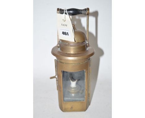 A brass railway oil lamp.