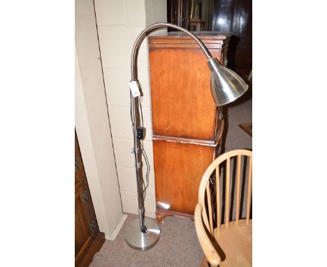 A modern little anglepoise standard lamp.