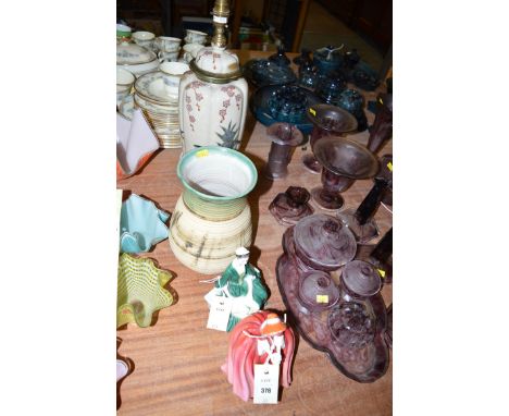 Two Royal Doulton figurines: a lady of Williamsburg and Denise; together with a factory vase; and a floral decorated table la